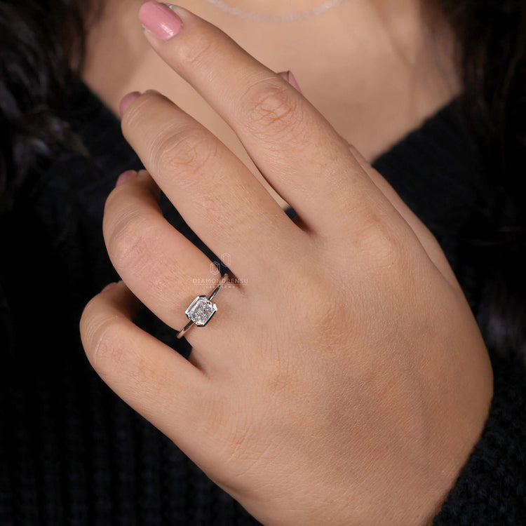 Radiant engagement ring featuring a solitaire diamond and handcrafted detail in a diamond ring UK style.