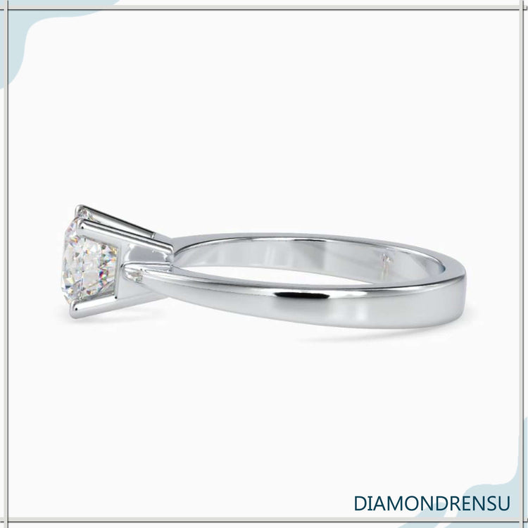 Designer solitaire ring with lab grown round cut diamond.