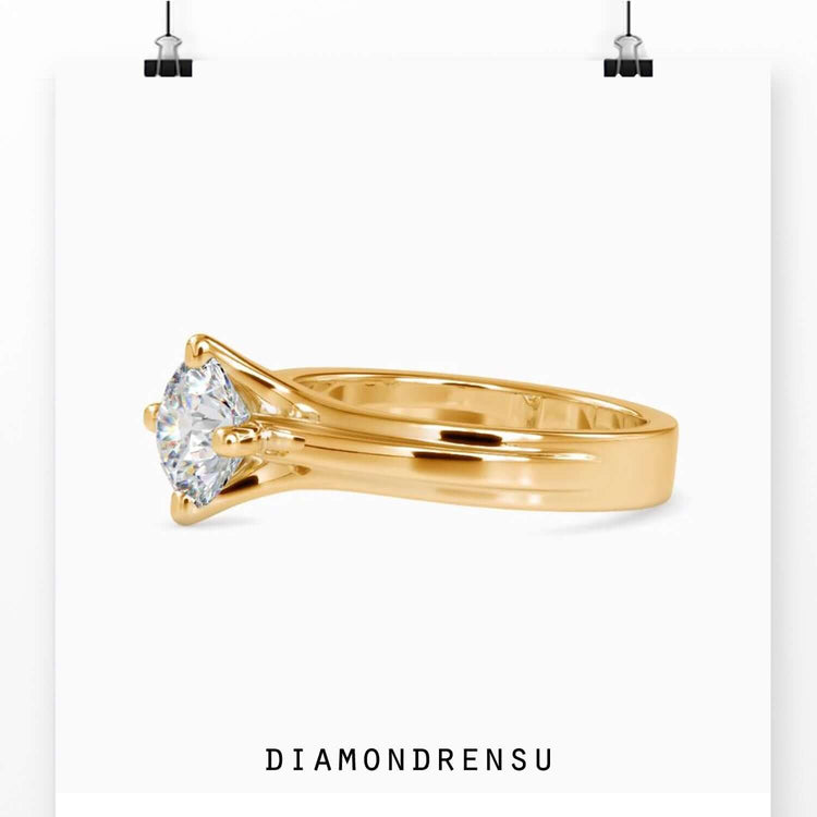 Handmade ring featuring a round cut lab grown diamond.
