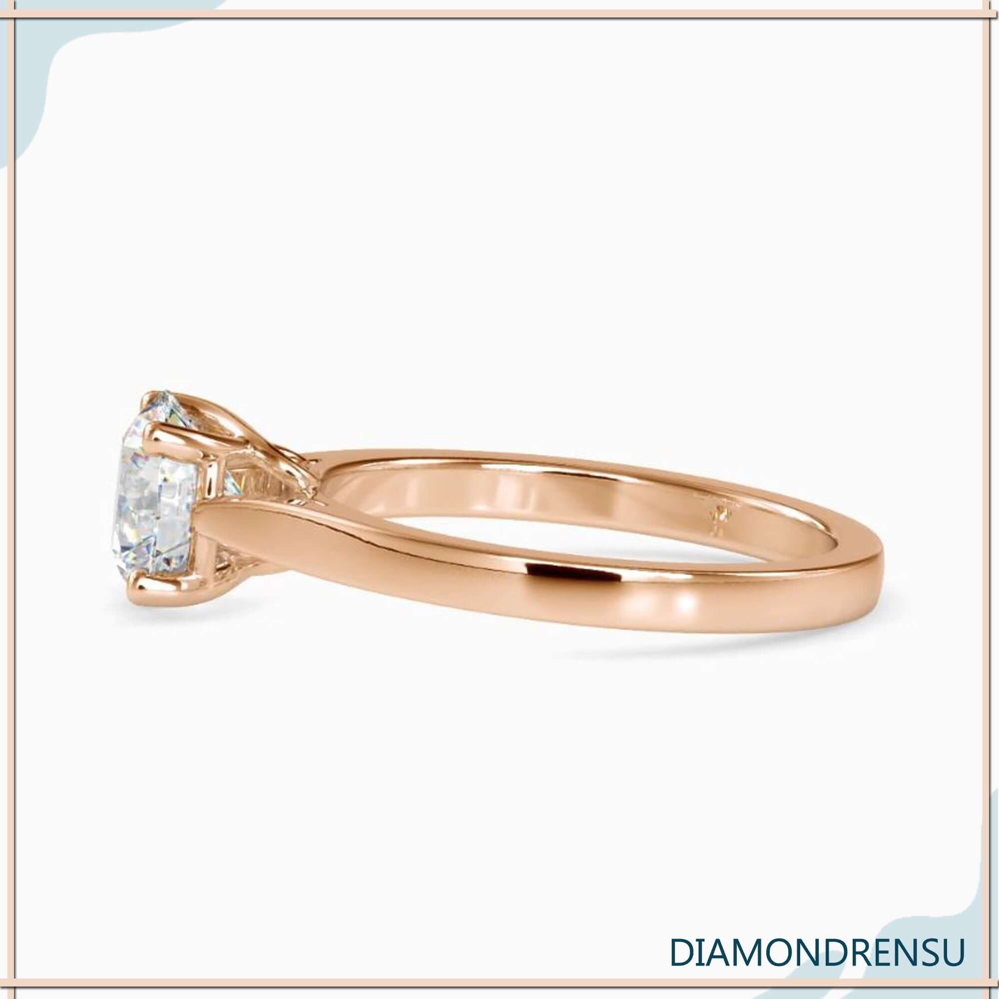Diamondrensu UK engagement ring with rose gold finish.