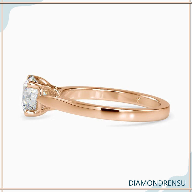 Diamondrensu UK engagement ring with rose gold finish.