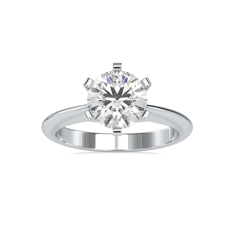 Rose gold solitaire ring featuring round cut lab diamond.
