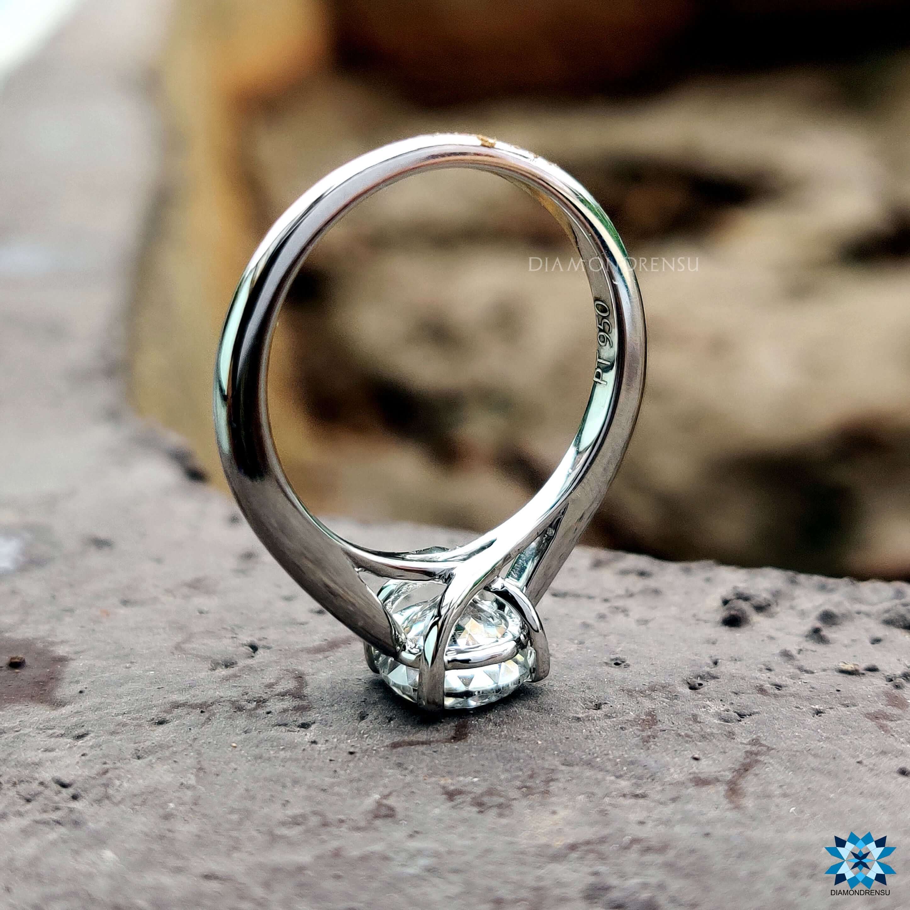 Custom engagement ring with Portuguese moissanite cut.