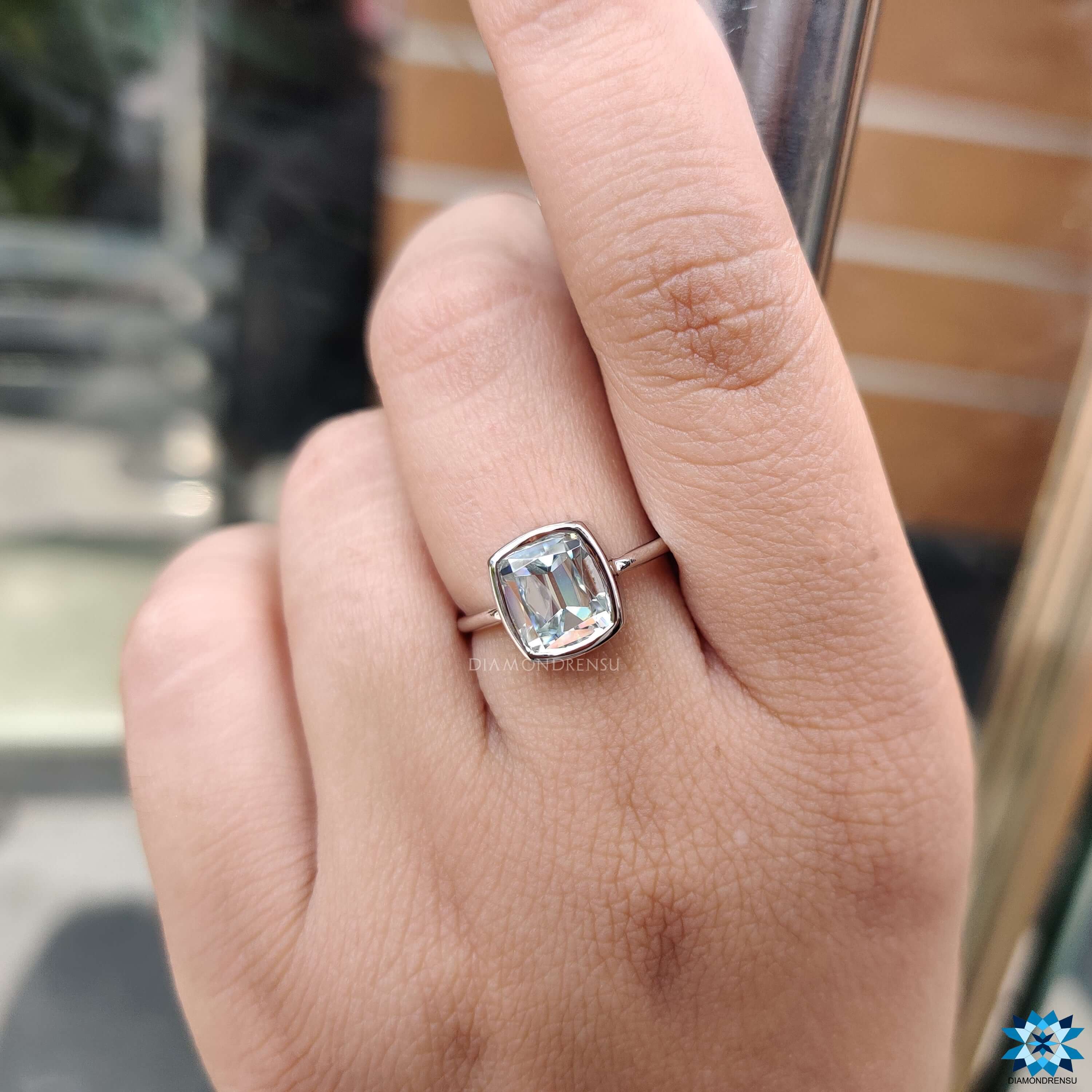 White gold moissanite ring with old European style cut.