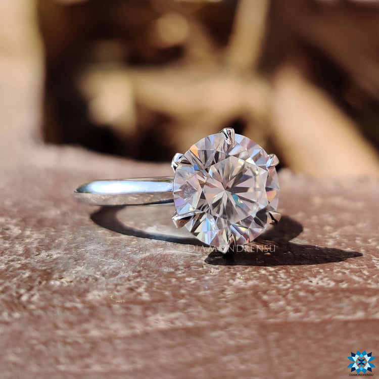 Handmade white gold moissanite solitaire ring.