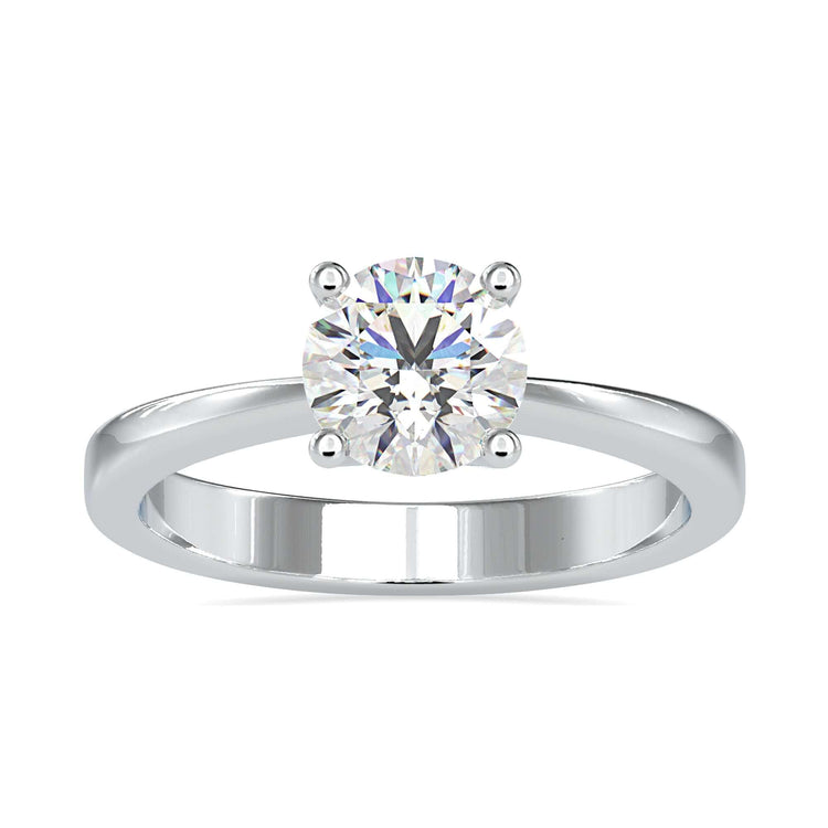 Simple diamond ring with round solitaire and tapered band.