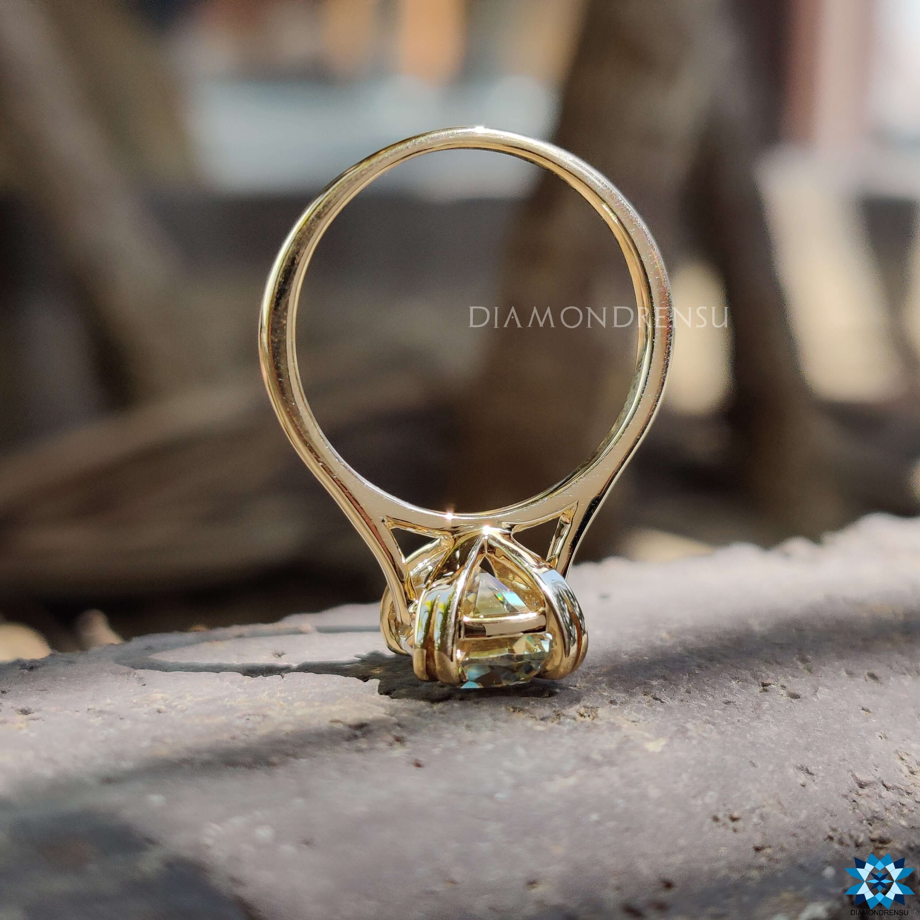 Old European cut moissanite ring with double prong setting.