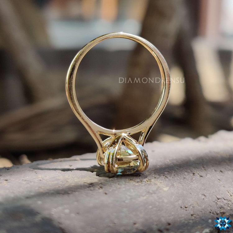 Old European cut moissanite ring with double prong setting.