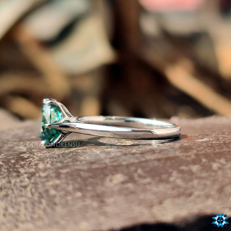 White gold tulip engagement ring with cathedral setting.