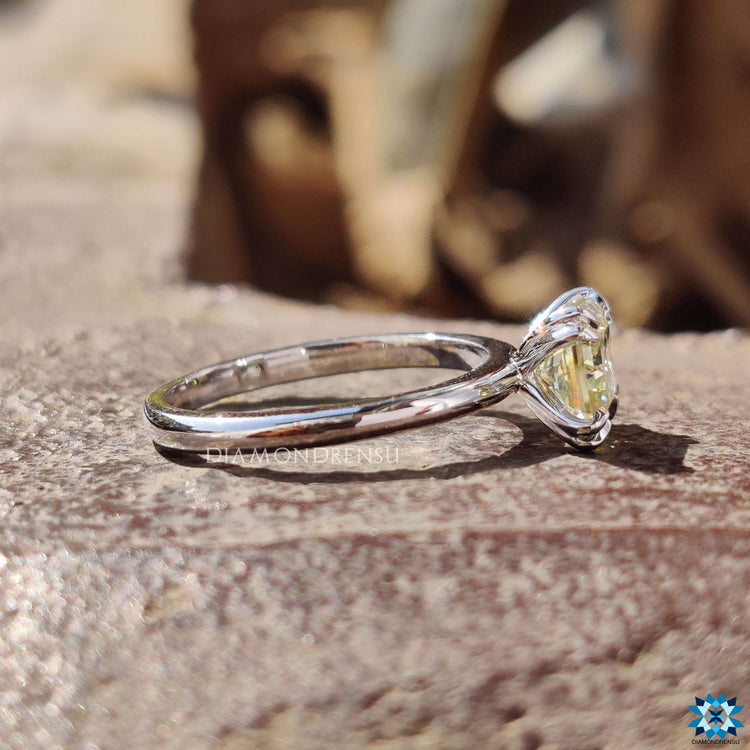 Handmade ring featuring pale yellow moissanite.
