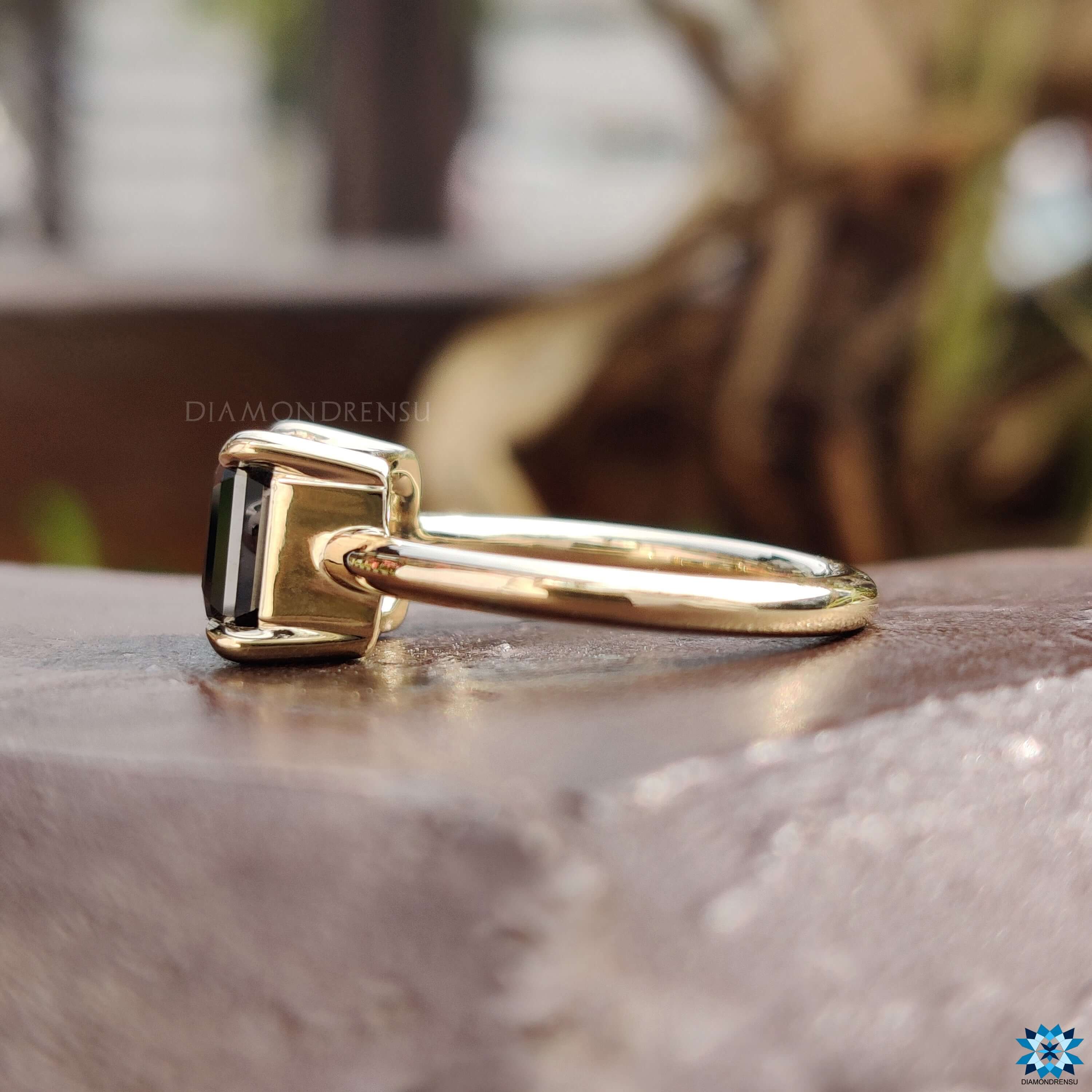 East west emerald cut ring.