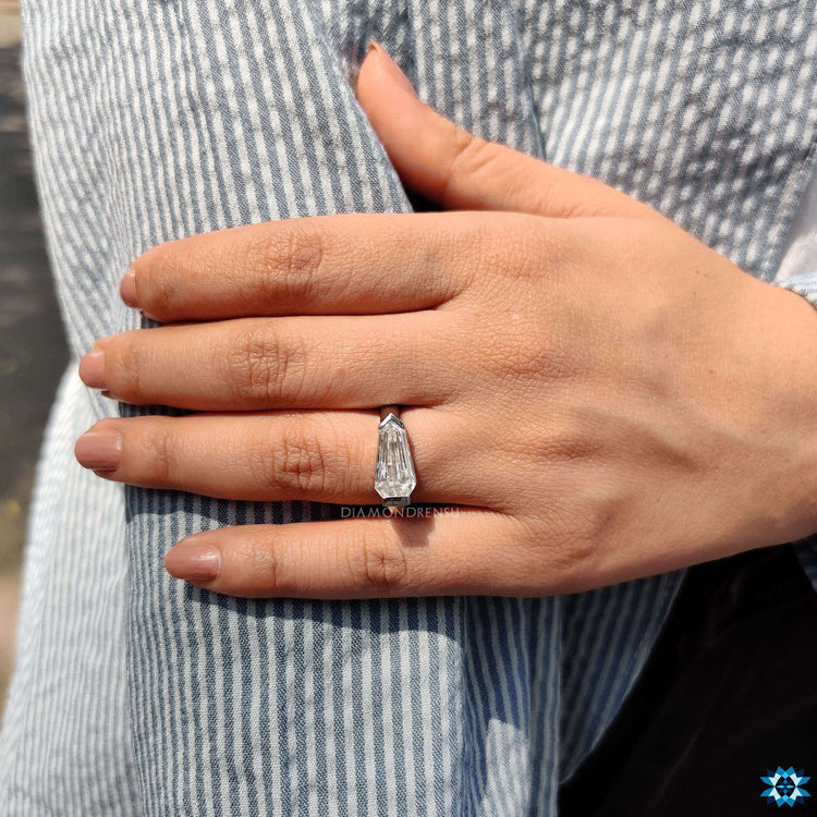 Handmade solitaire ring with moissanite center.