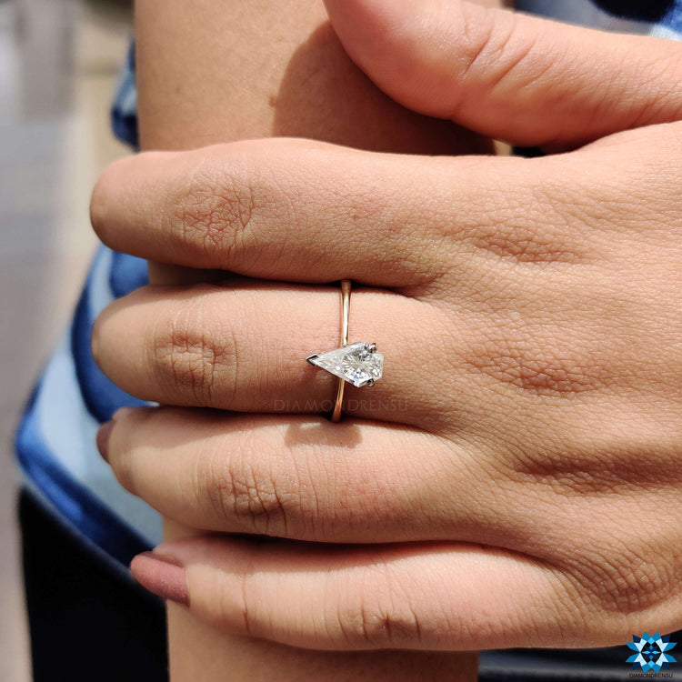 Buy moissanite ring with solitaire spear cut design.