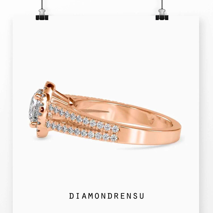 Round cut lab diamond ring with split shank and halo.