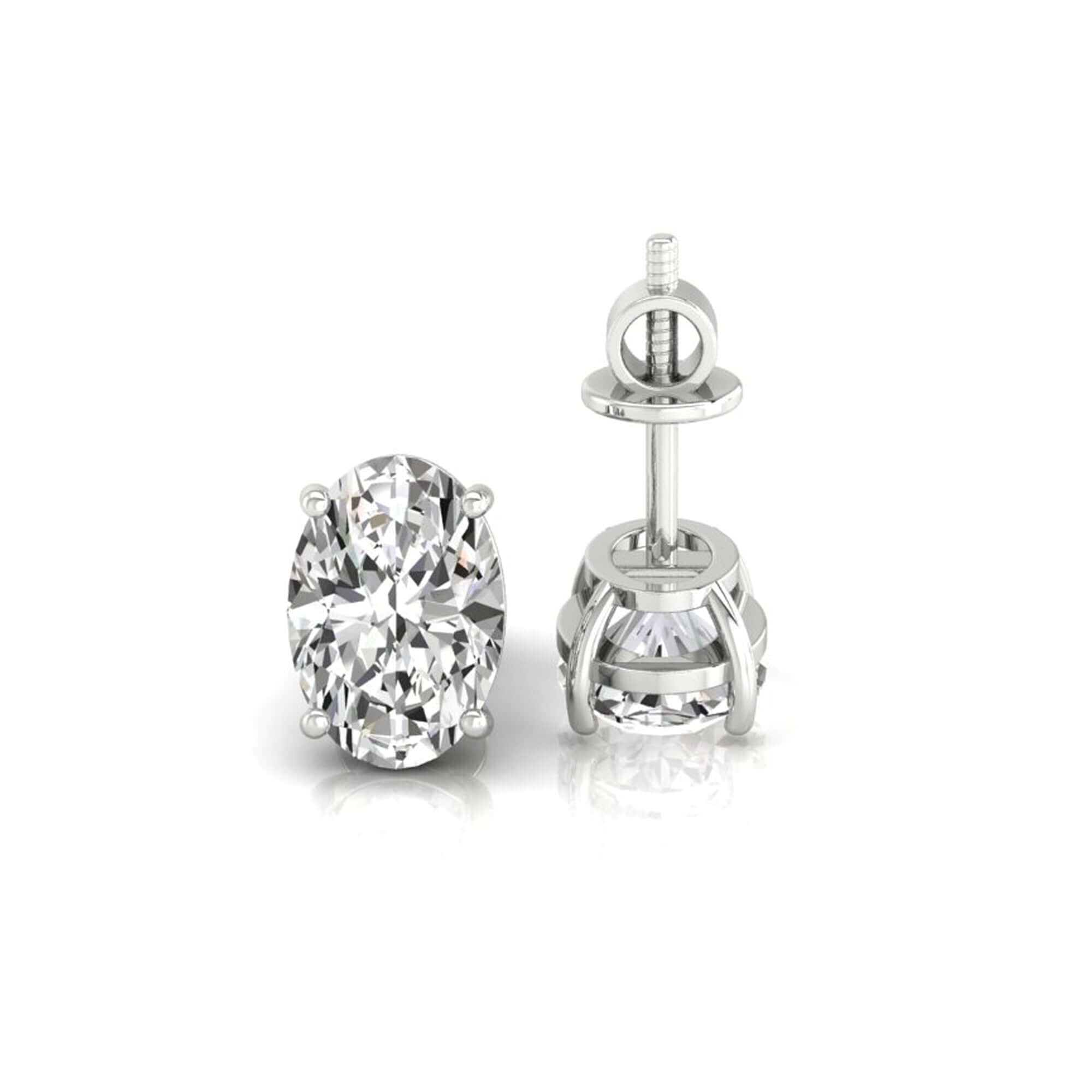 Handmade jewellery featuring oval cut diamond gold stud earrings.