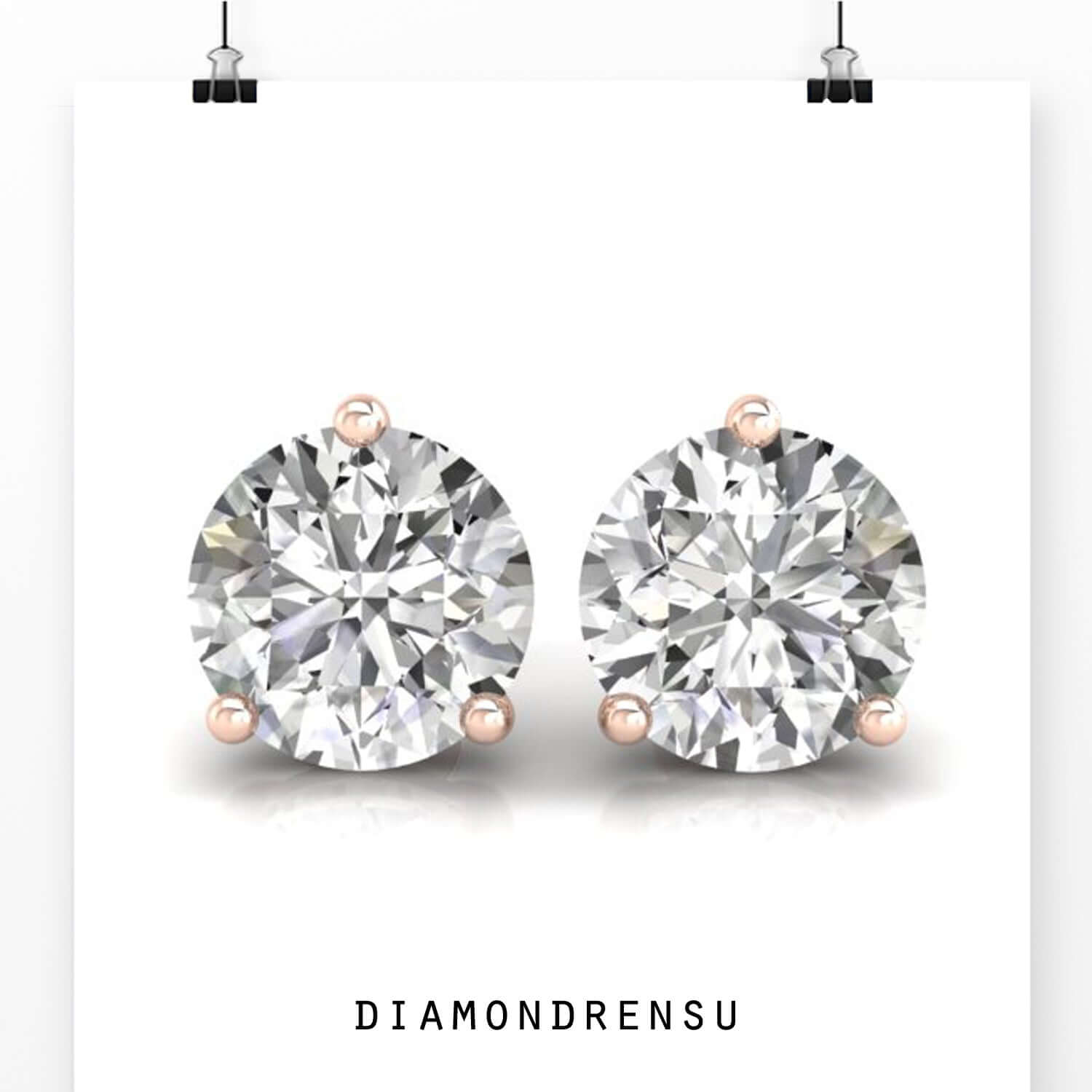 Gold diamond earrings with round cut stones and screw back closure.