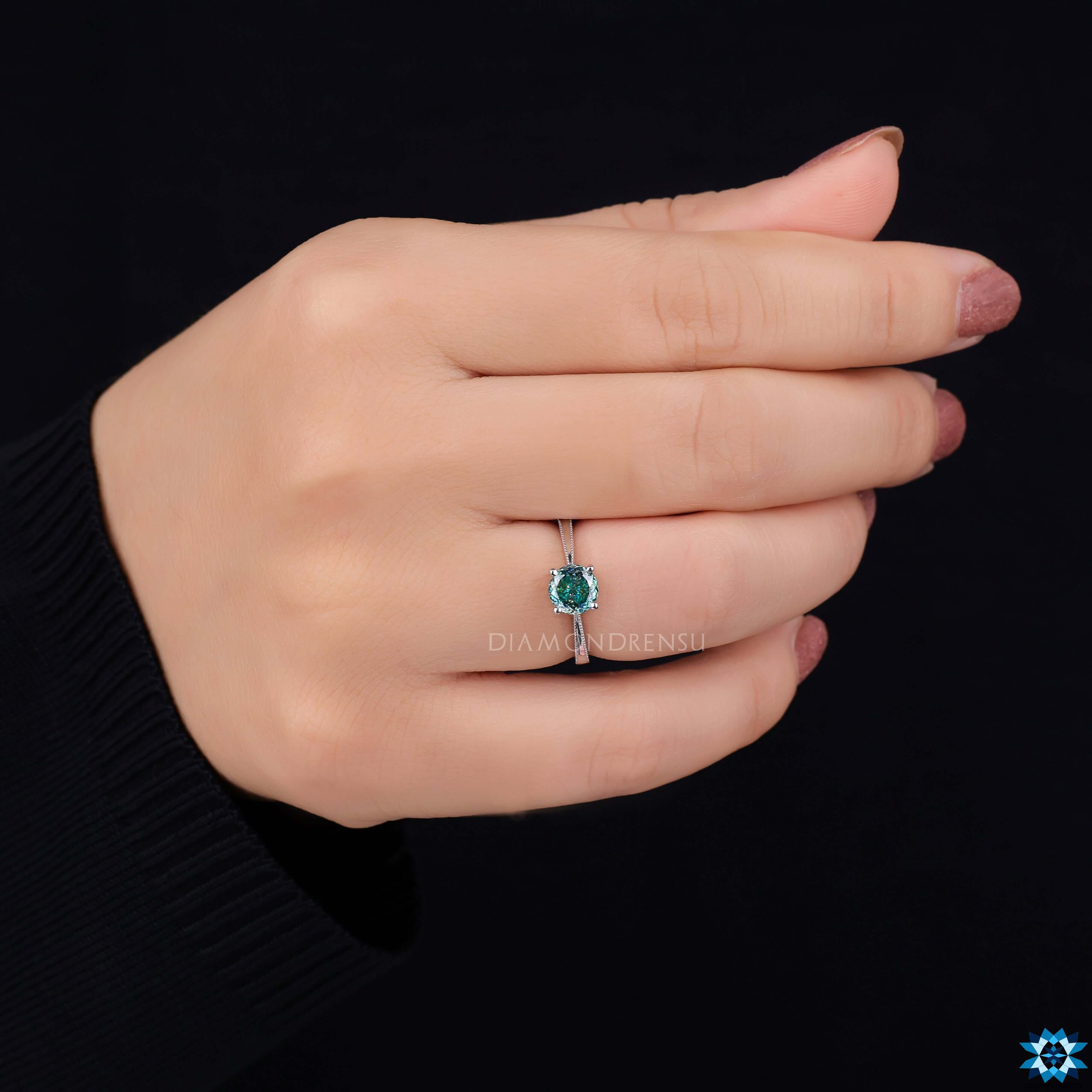 Milgrain setting ring with solitaire engagement design.