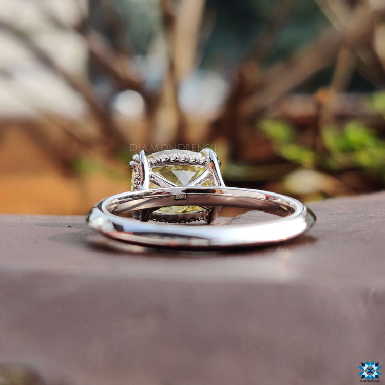 Custom engagement ring featuring hidden halo design.