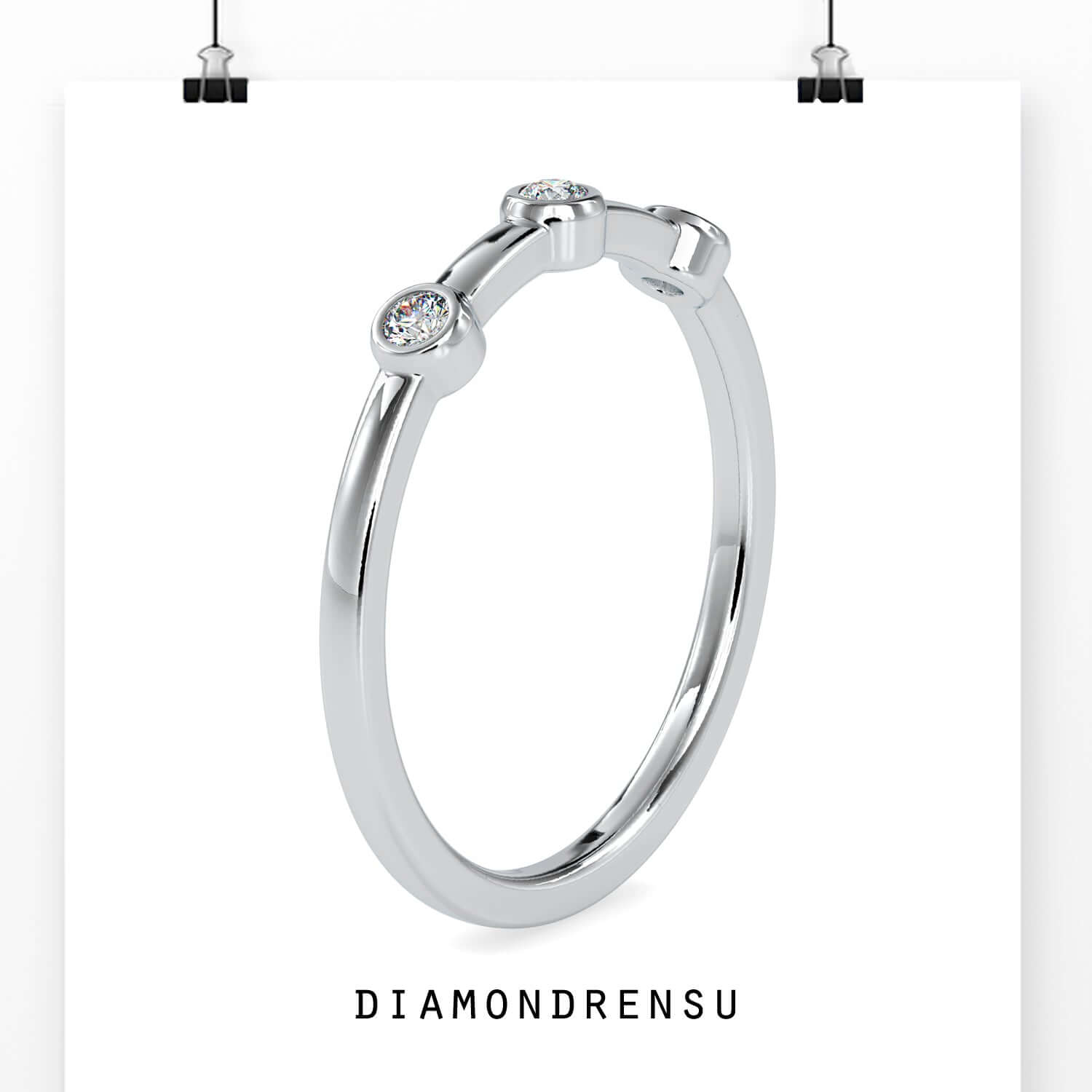White gold bezel set wedding band with handmade finish.