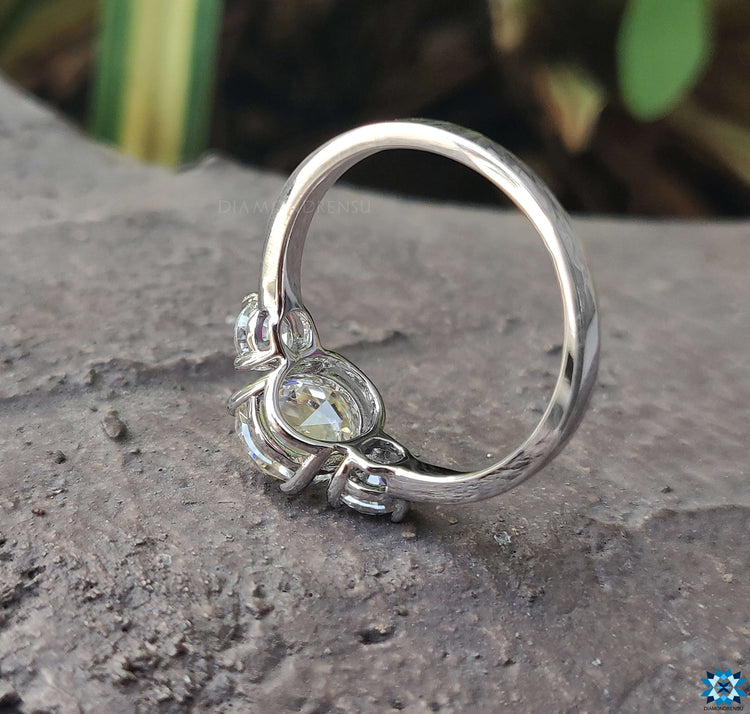 Vintage ring design featuring an oval shaped engagement ring for timeless appeal.