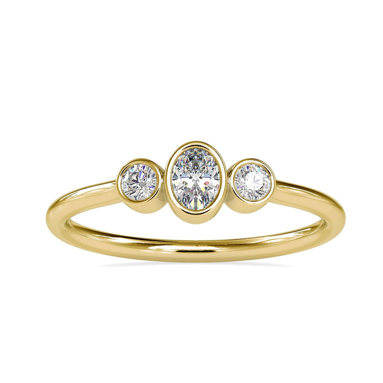 UK engagement ring with three stone layout in rose gold.