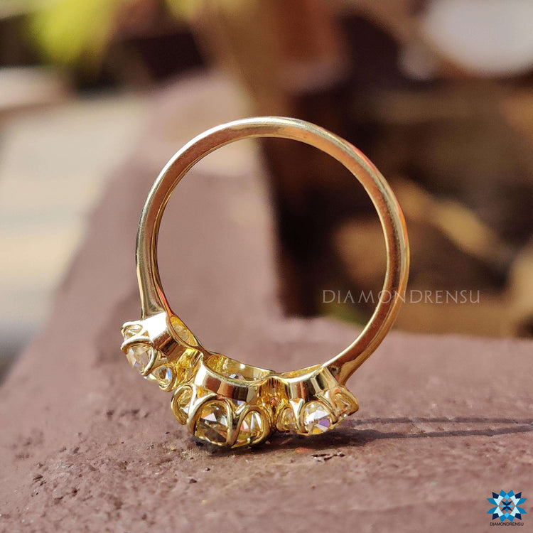 Handmade engagement ring with cushion old mine center stone.