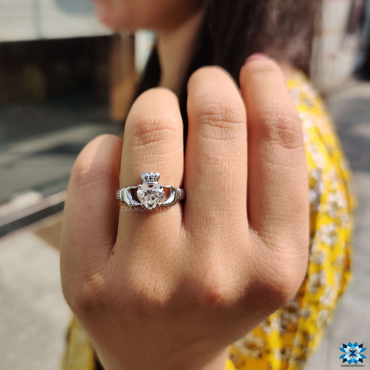 Heart shaped moissanite ring in white gold setting.