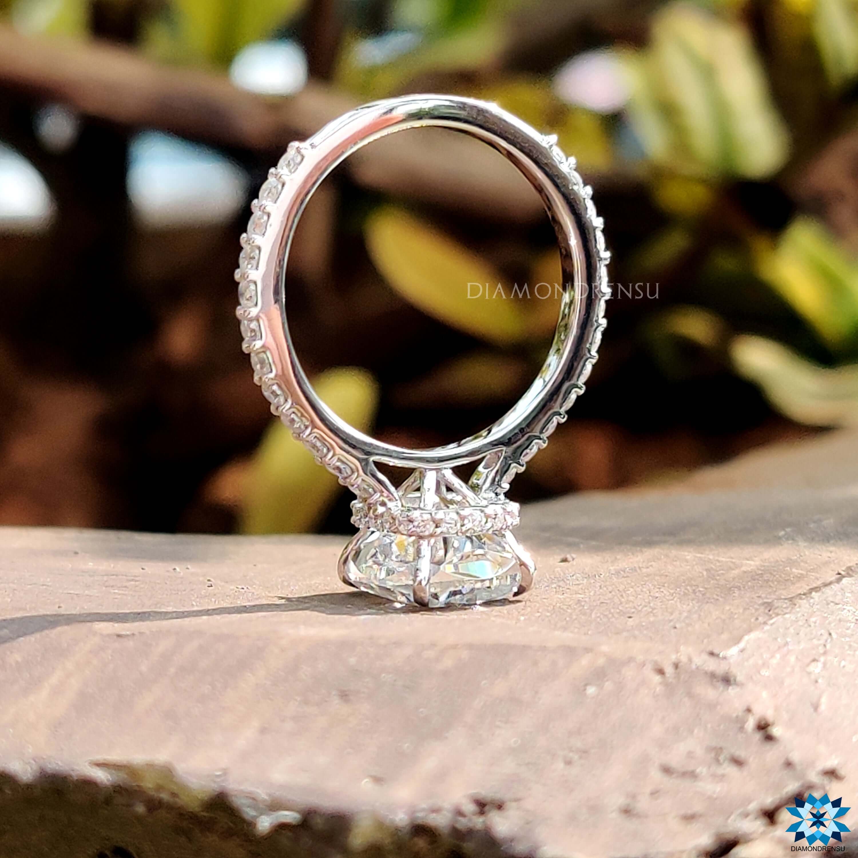 Handmade ring with crushed ice cushion cut center.