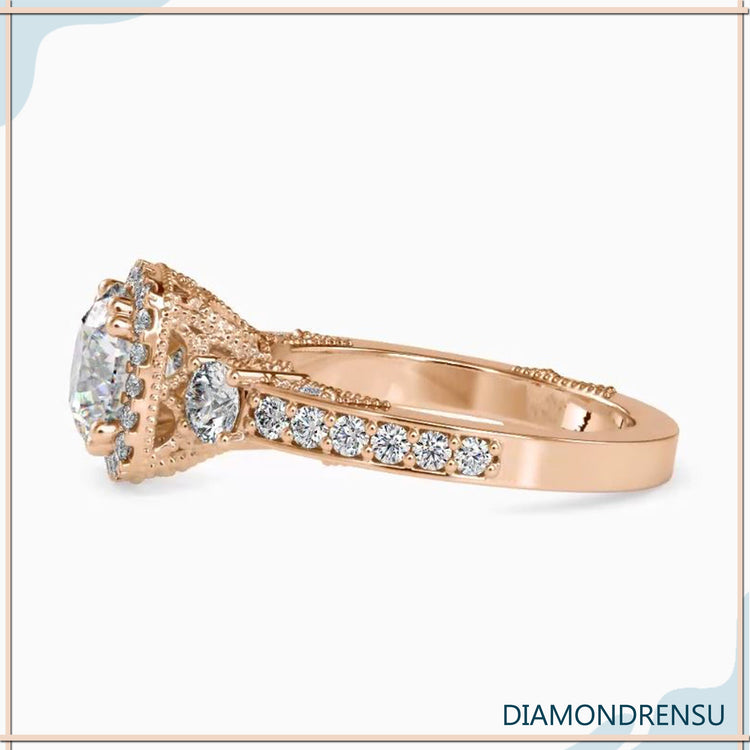 Diamondrensu UK ring with pave and 3 diamond layout.