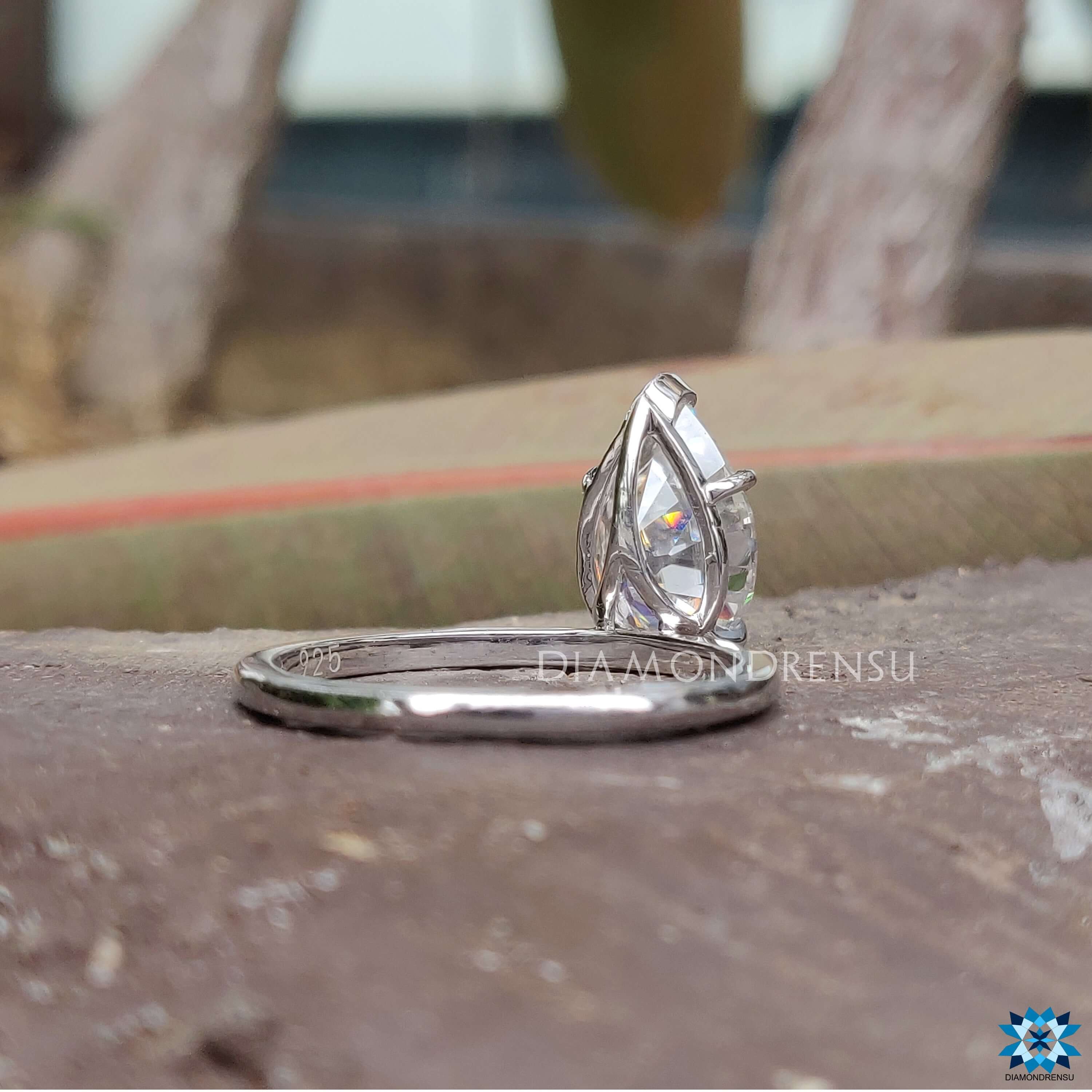 White gold ring with prong setting and pear Rensu cut centre stone by Diamondrensu UK.