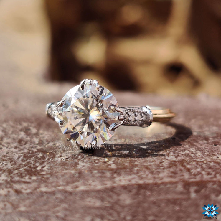 Moissanite engagement ring in round cut and prong setting.