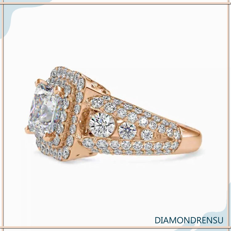 Diamondrensu UK ring with pave halo and round stones.