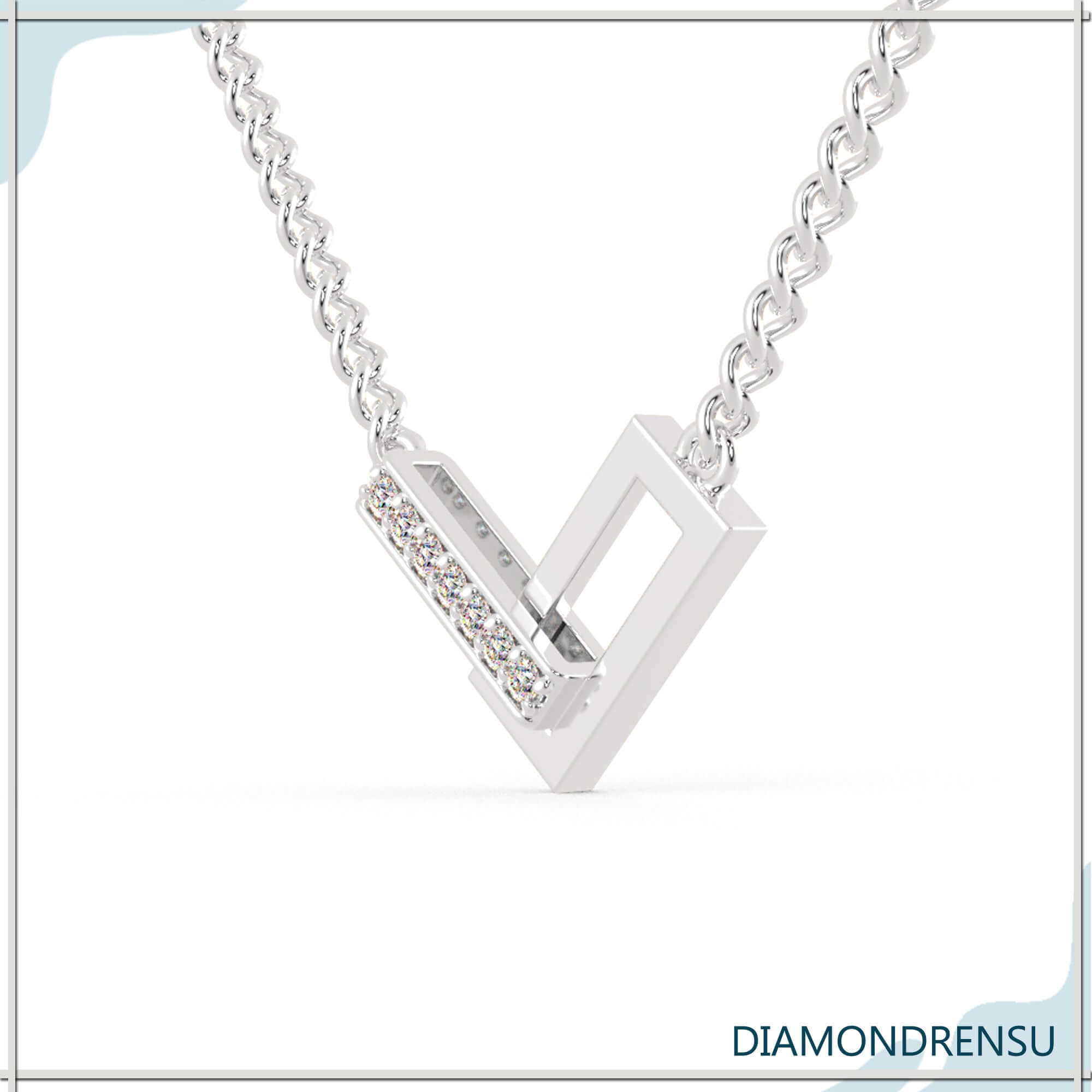 Open frame pendant in V design with gold and round cut diamond.