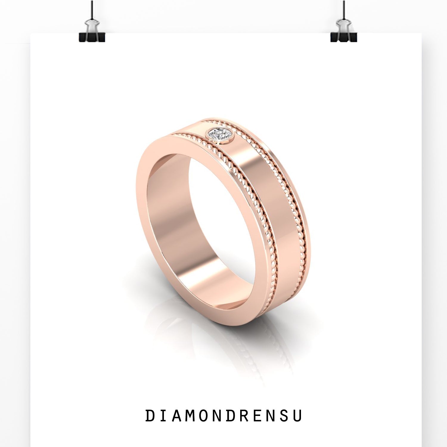 Men’s gold wedding band with round diamond and rope edge.