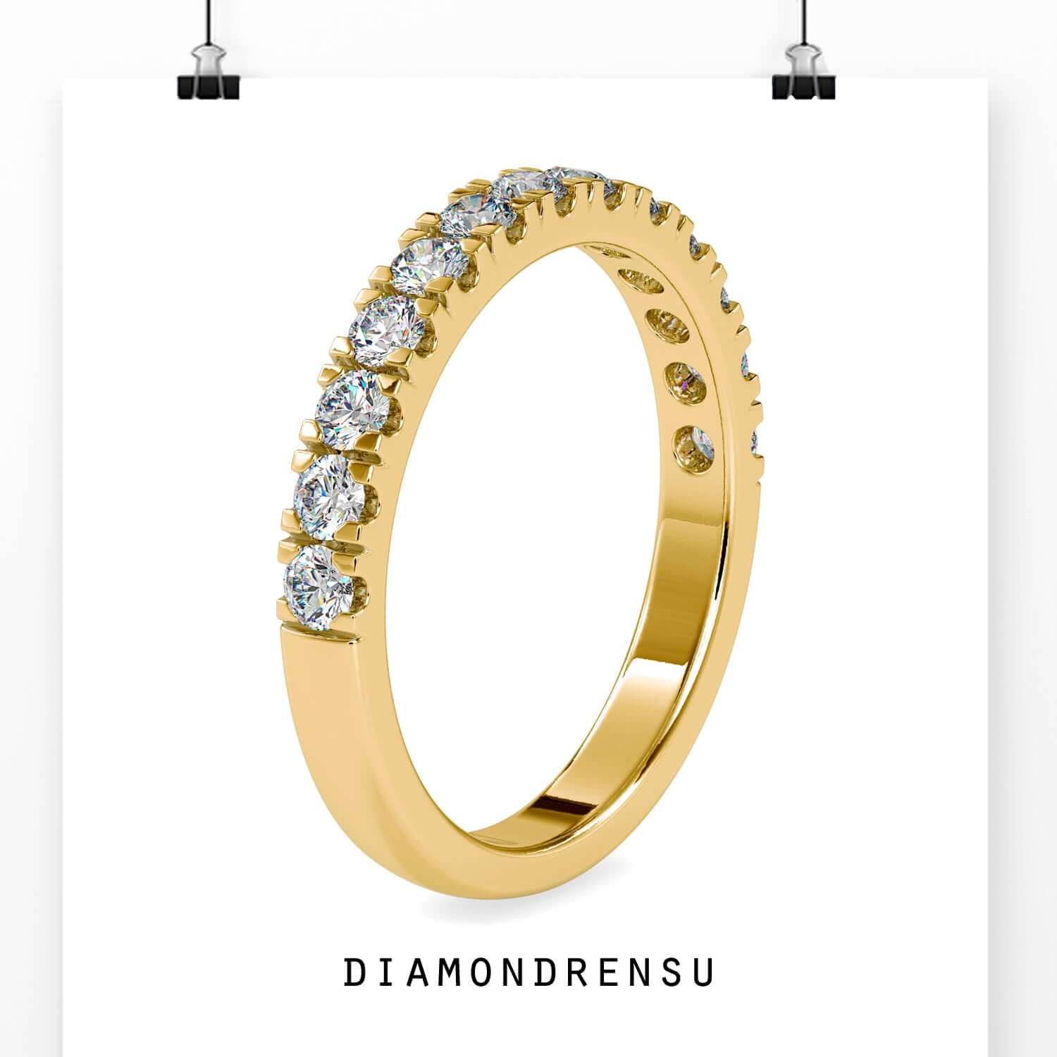 Gold wedding band designed with lab grown stones.