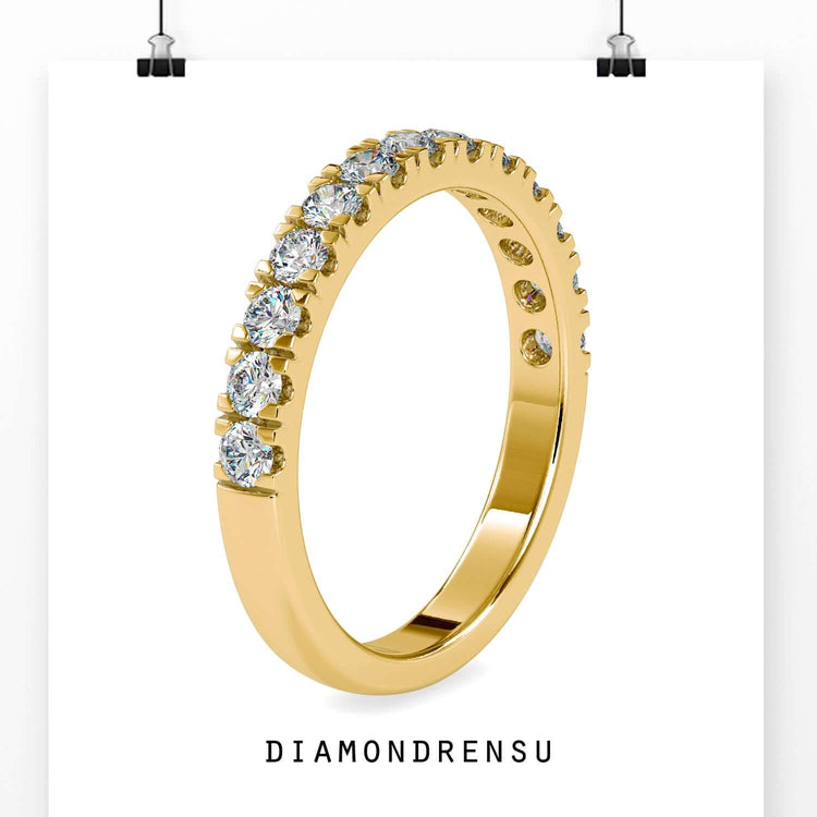 Gold wedding band designed with lab grown stones.