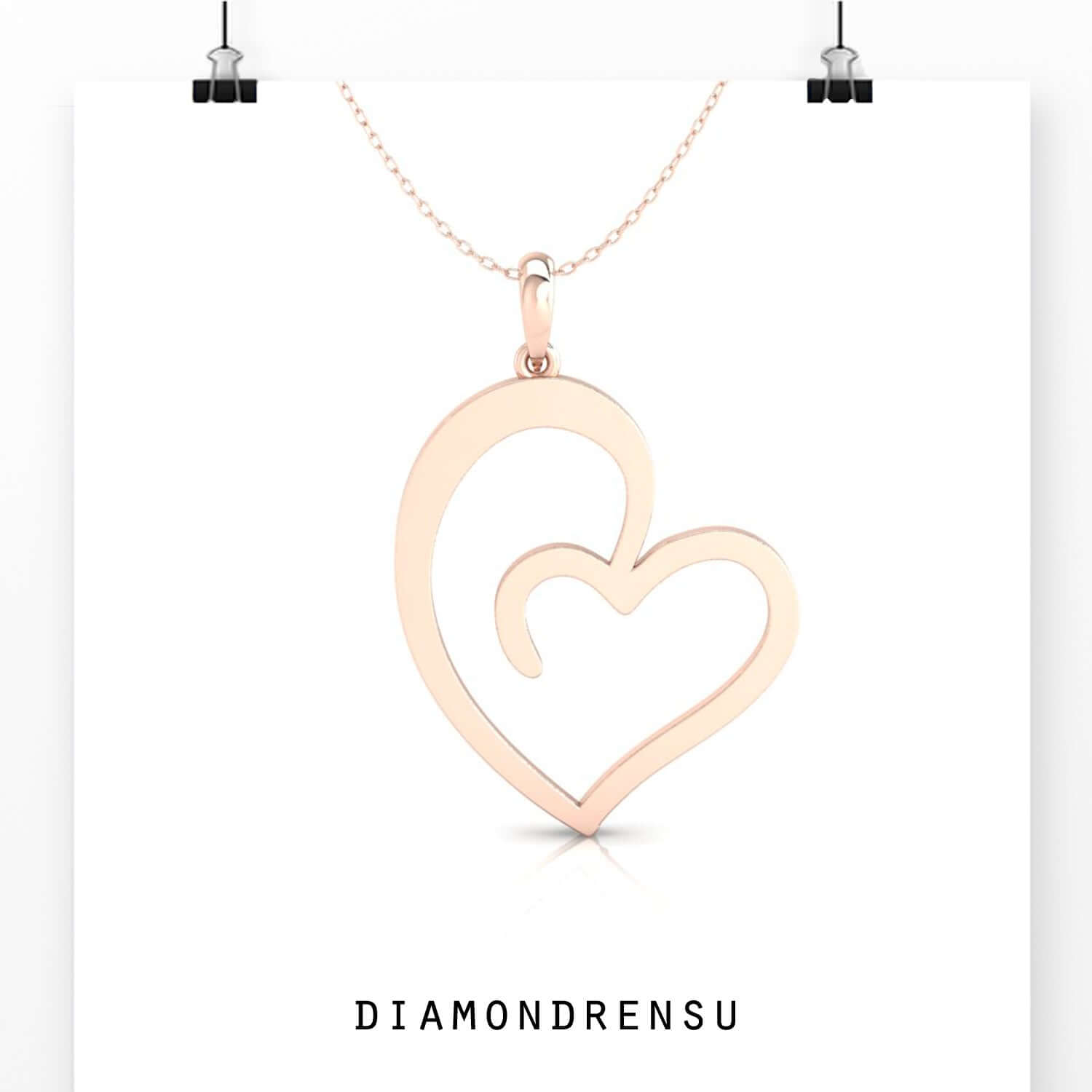 Heart with diamond pendant featuring shared prong setting.