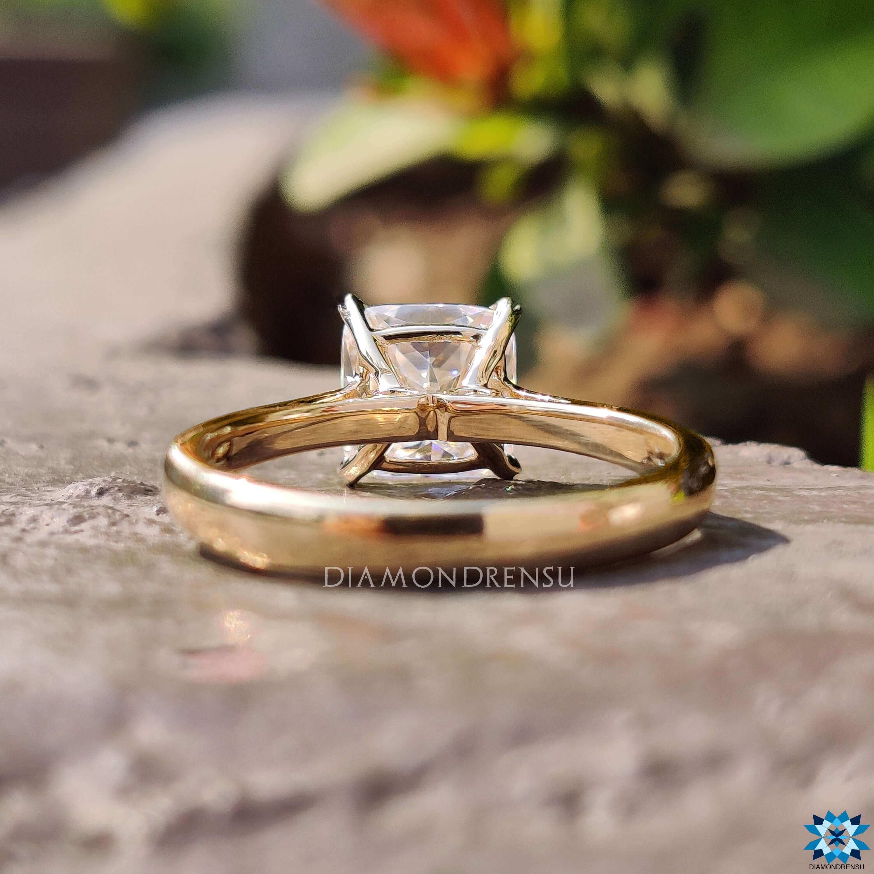 Custom engagement ring featuring Cushion Rensu stone.