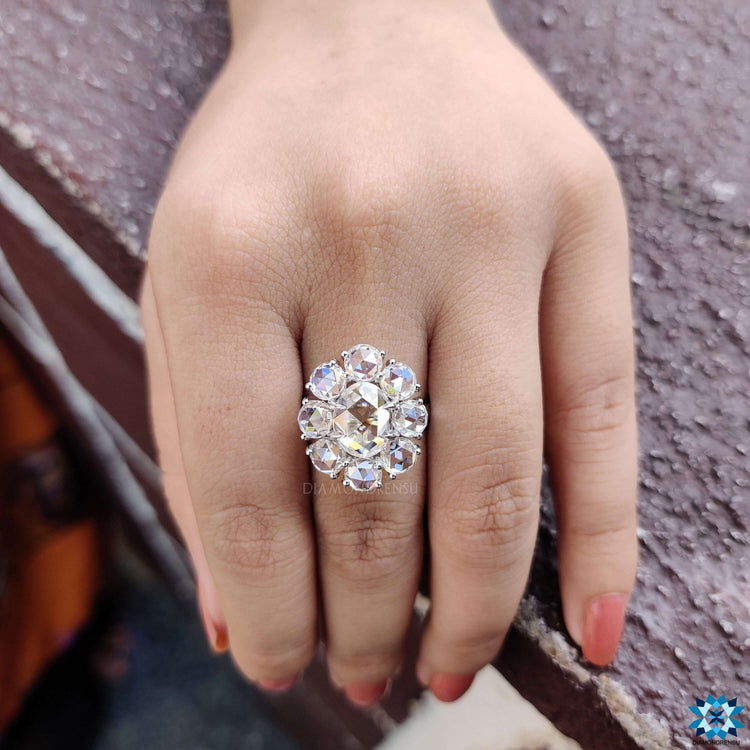 Flower style engagement ring with halo setting.
