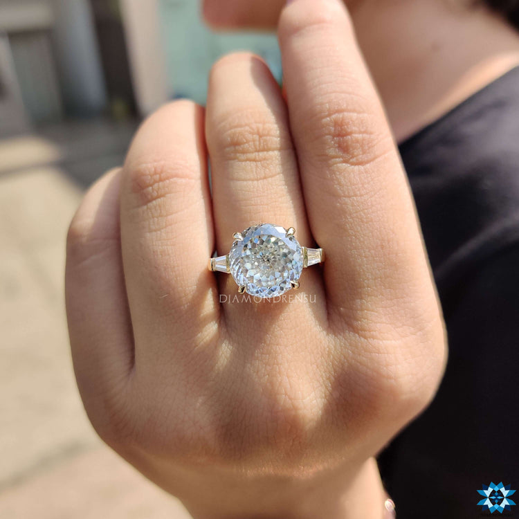 UK engagement ring with yellow gold band.