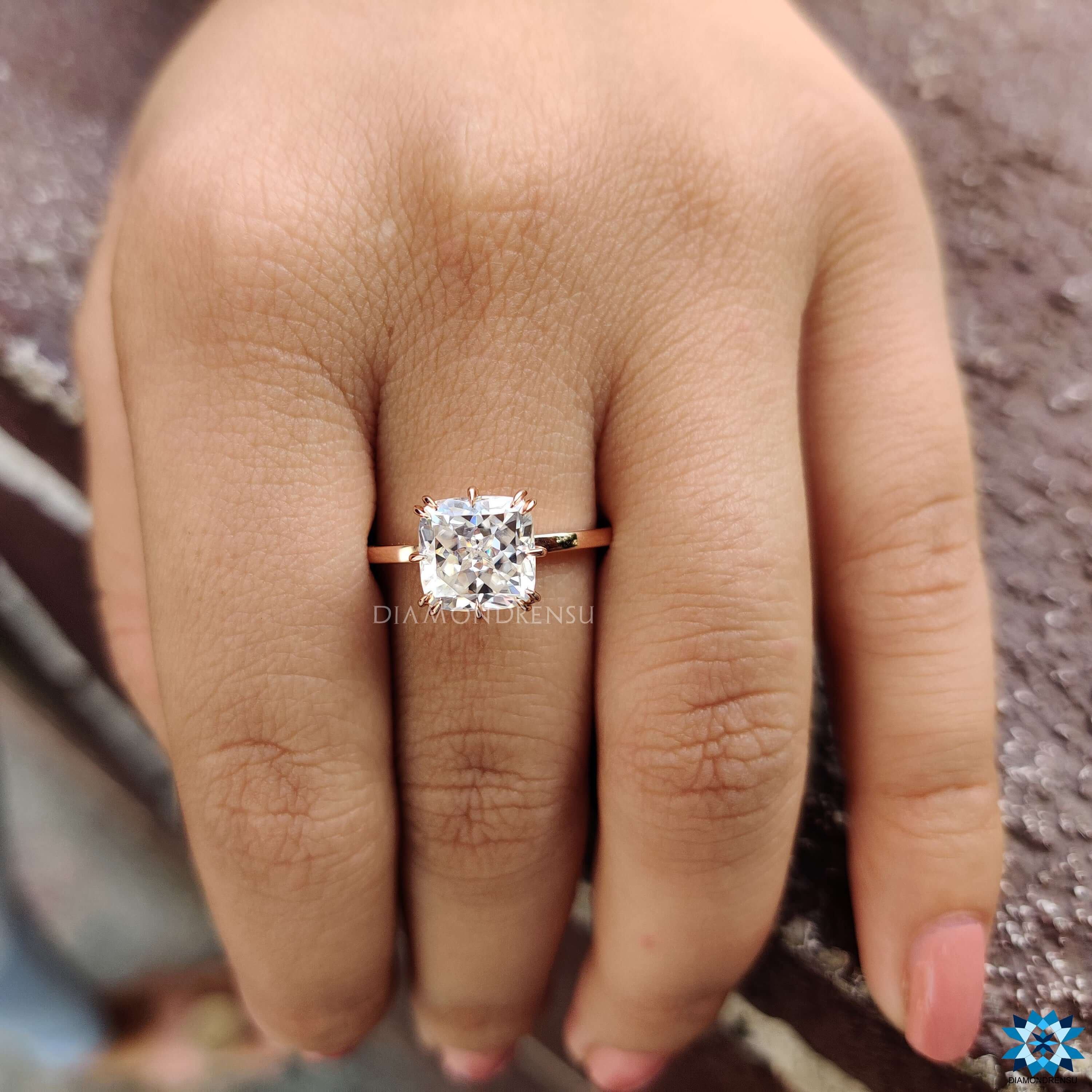 Cushion Rensu moissanite ring in rose gold.