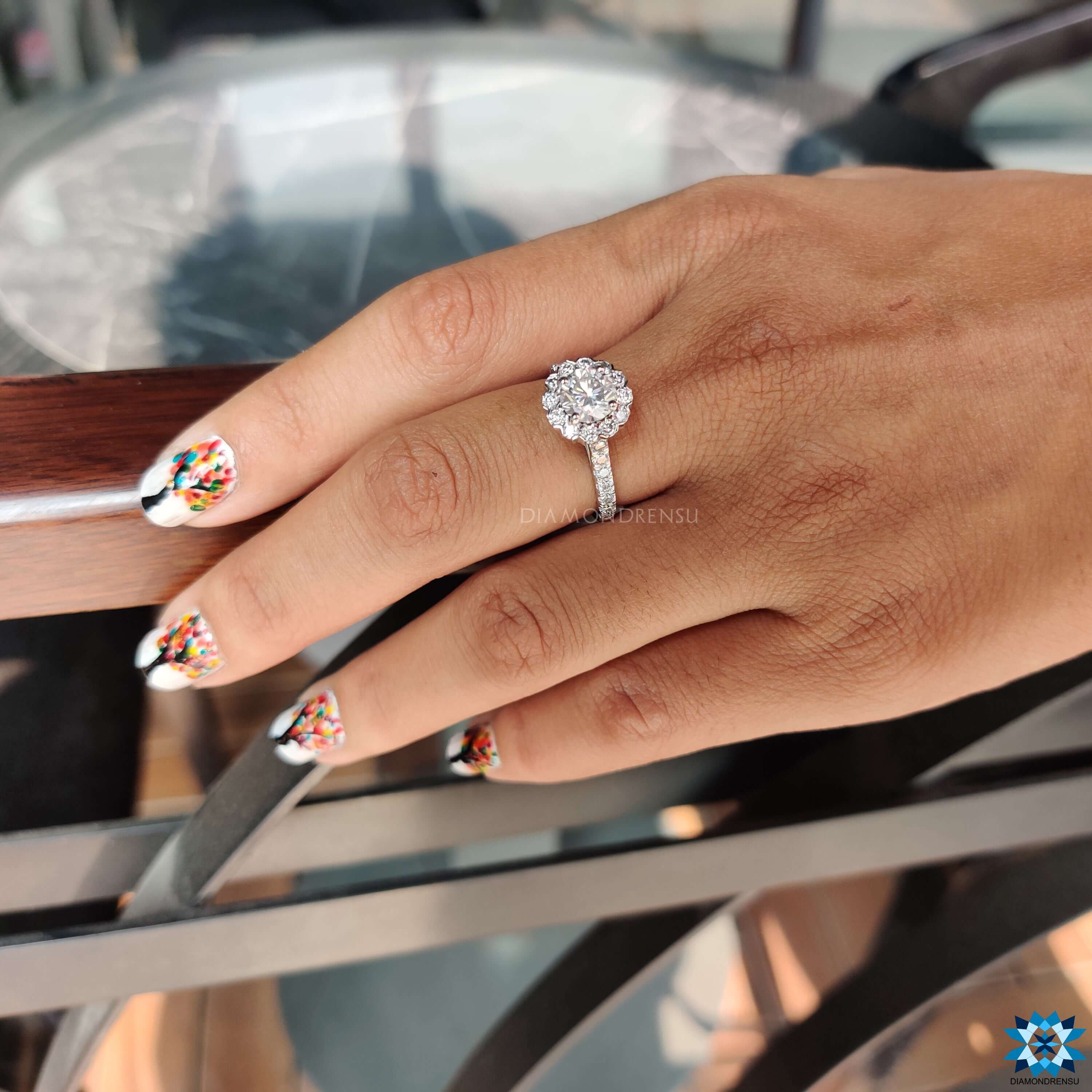 Round cut moissanite ring set in a classic and sophisticated design.