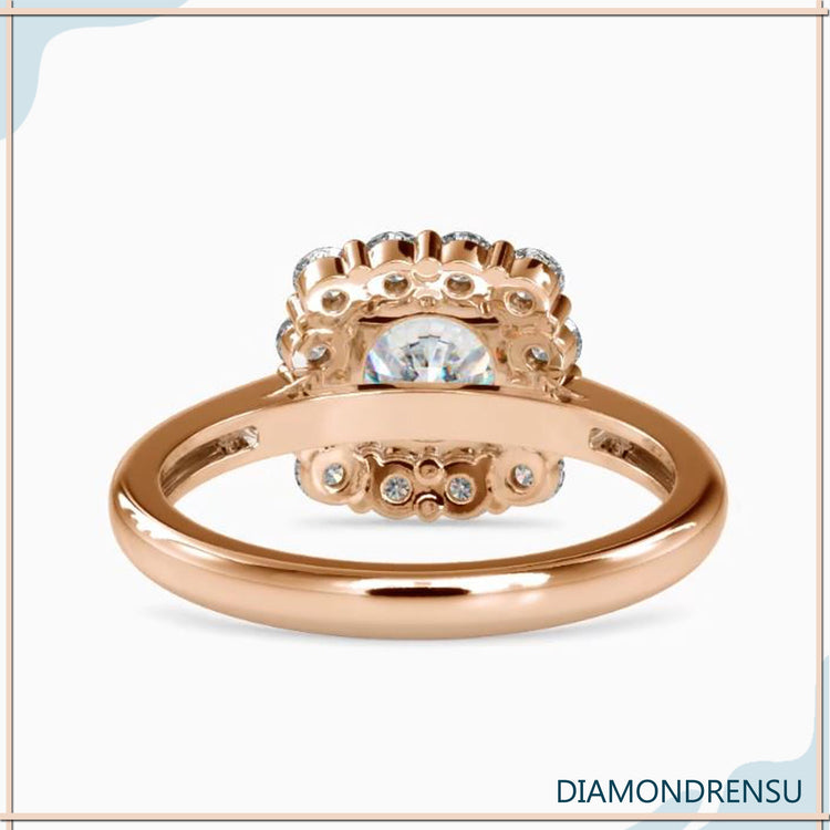 Handmade white gold ring with double prong set round cut diamond