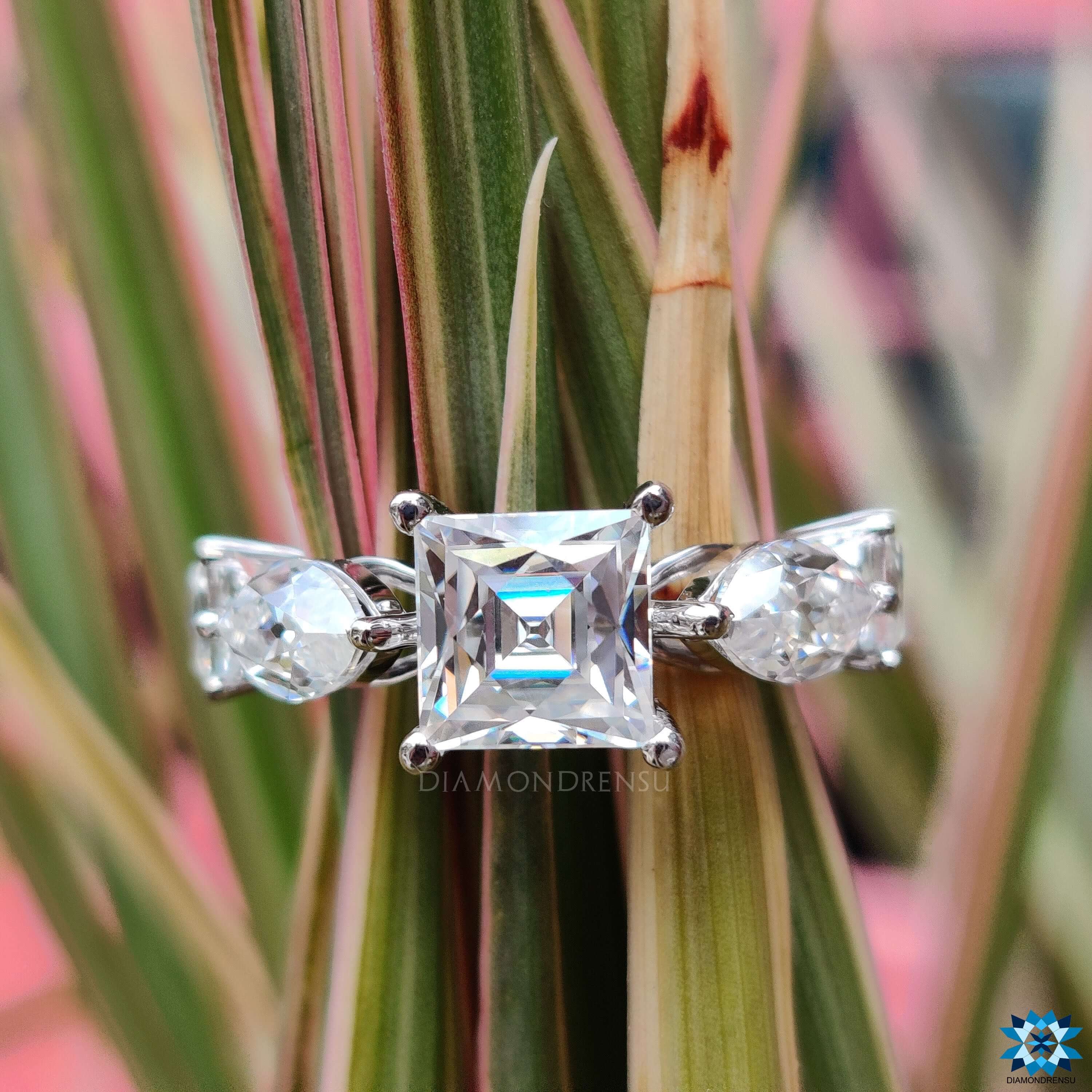 4 prong setting on marquise side stone ring.
