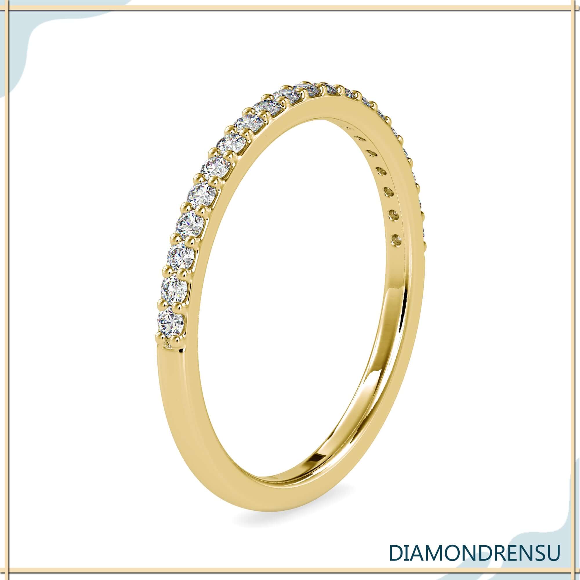 Rose gold stackable band with lab grown diamond accents.