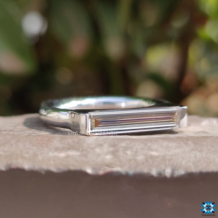 White gold ring with prong setting.