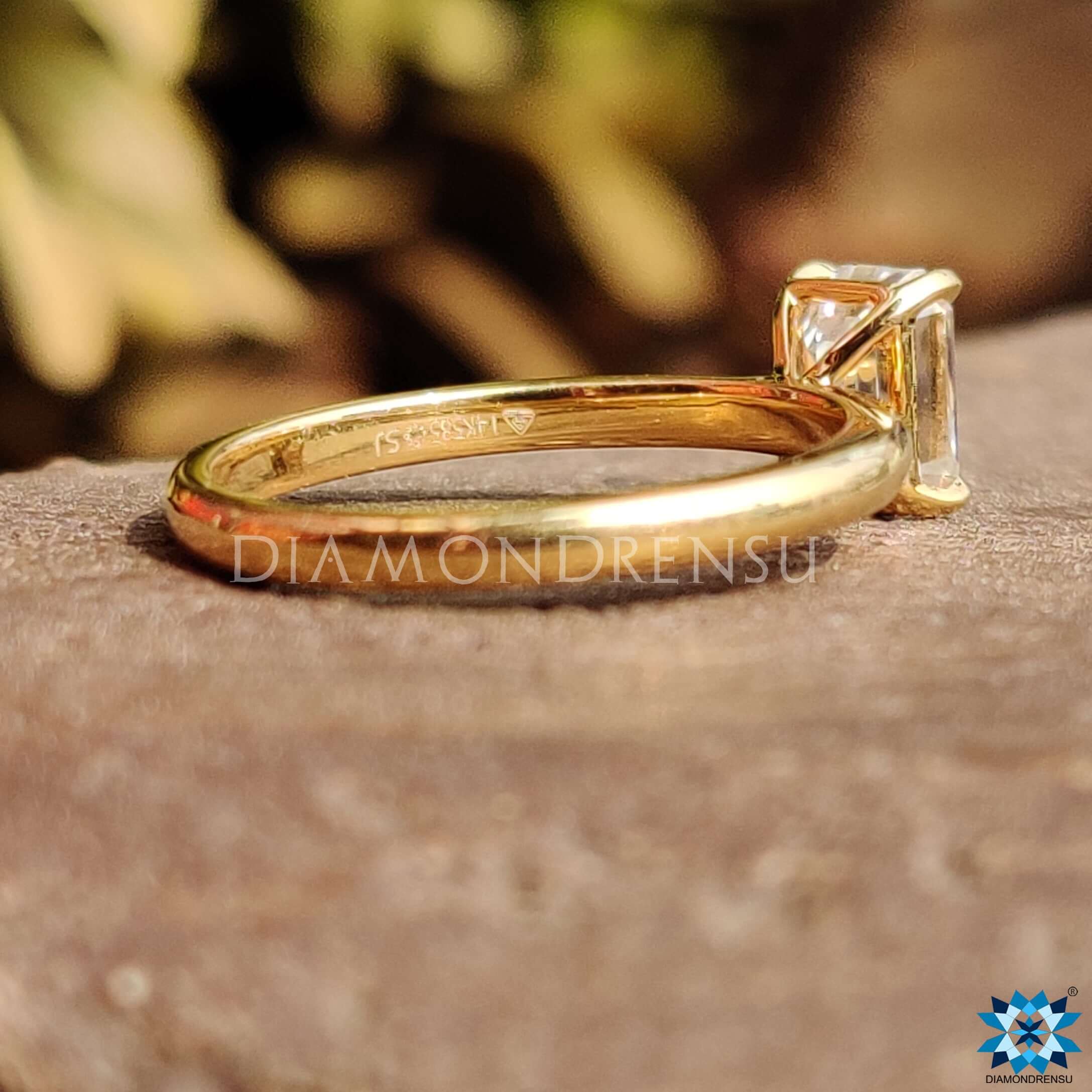 Custom emerald cut moissanite ring.