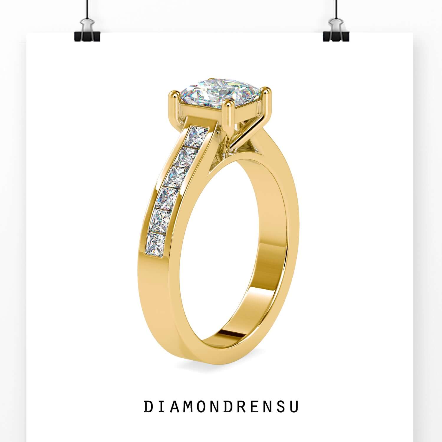 UK engagement ring with princess cut centre and pave band.