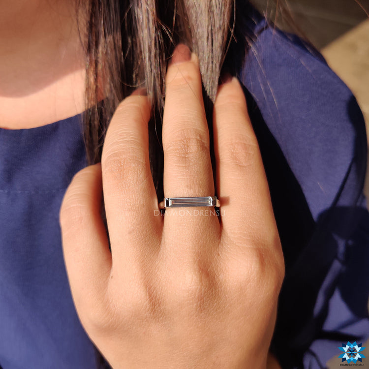 Handmade moissanite ring in white gold.