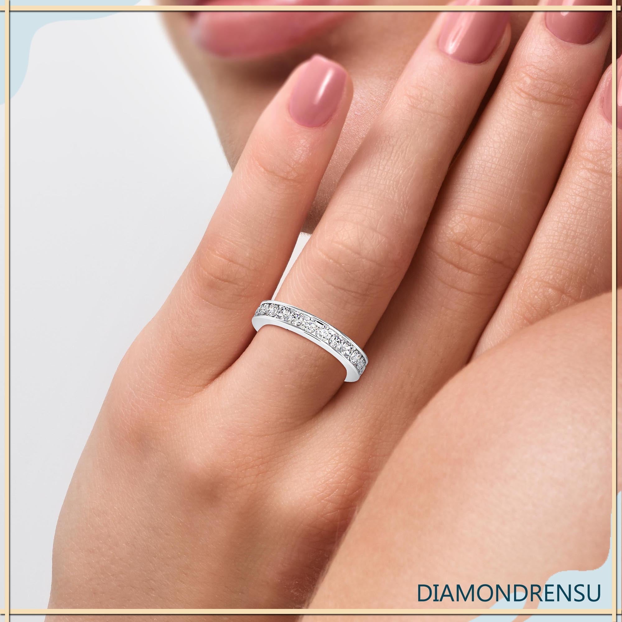 Buy channel set eternity wedding band in white gold.